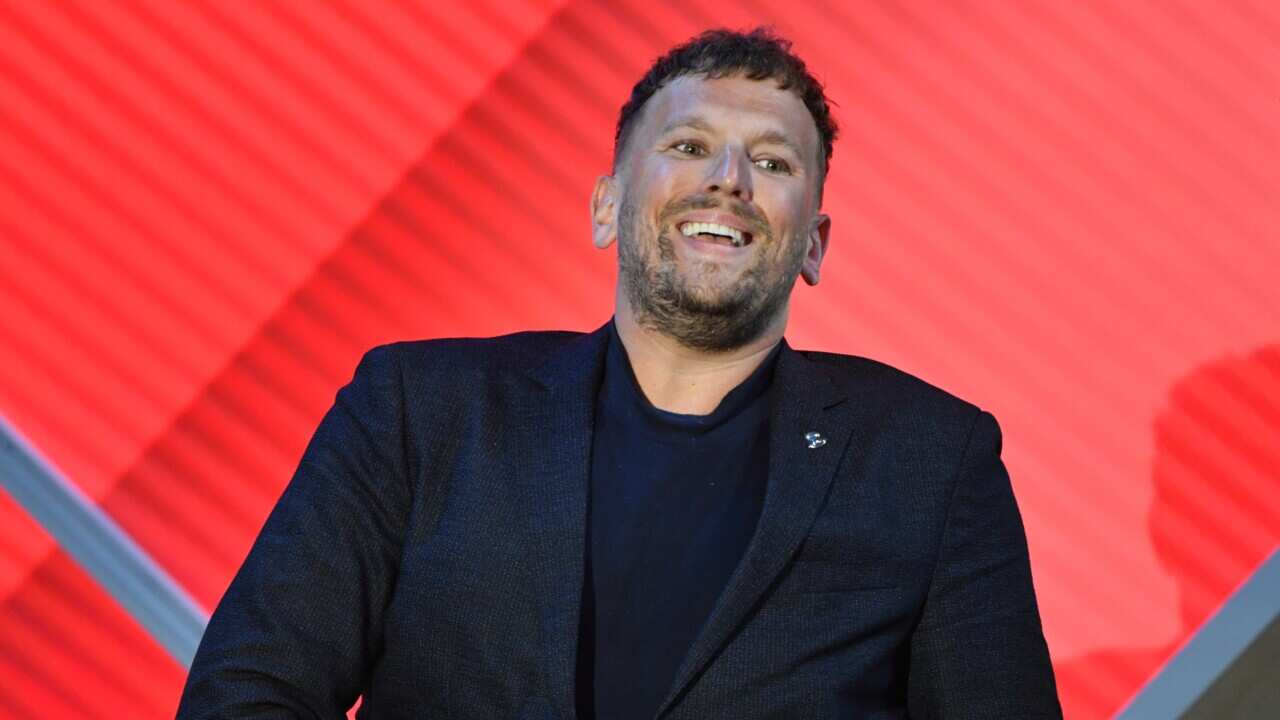 Victoria’s Australian of the Year Dylan Alcott on stage with the other nominees during the 2022 Australian of the Year Awards ceremony, at the National Arboretum in Canberra, Tuesday, January 25, 2022. (AAP Image/Mick Tsikas) NO ARCHIVING