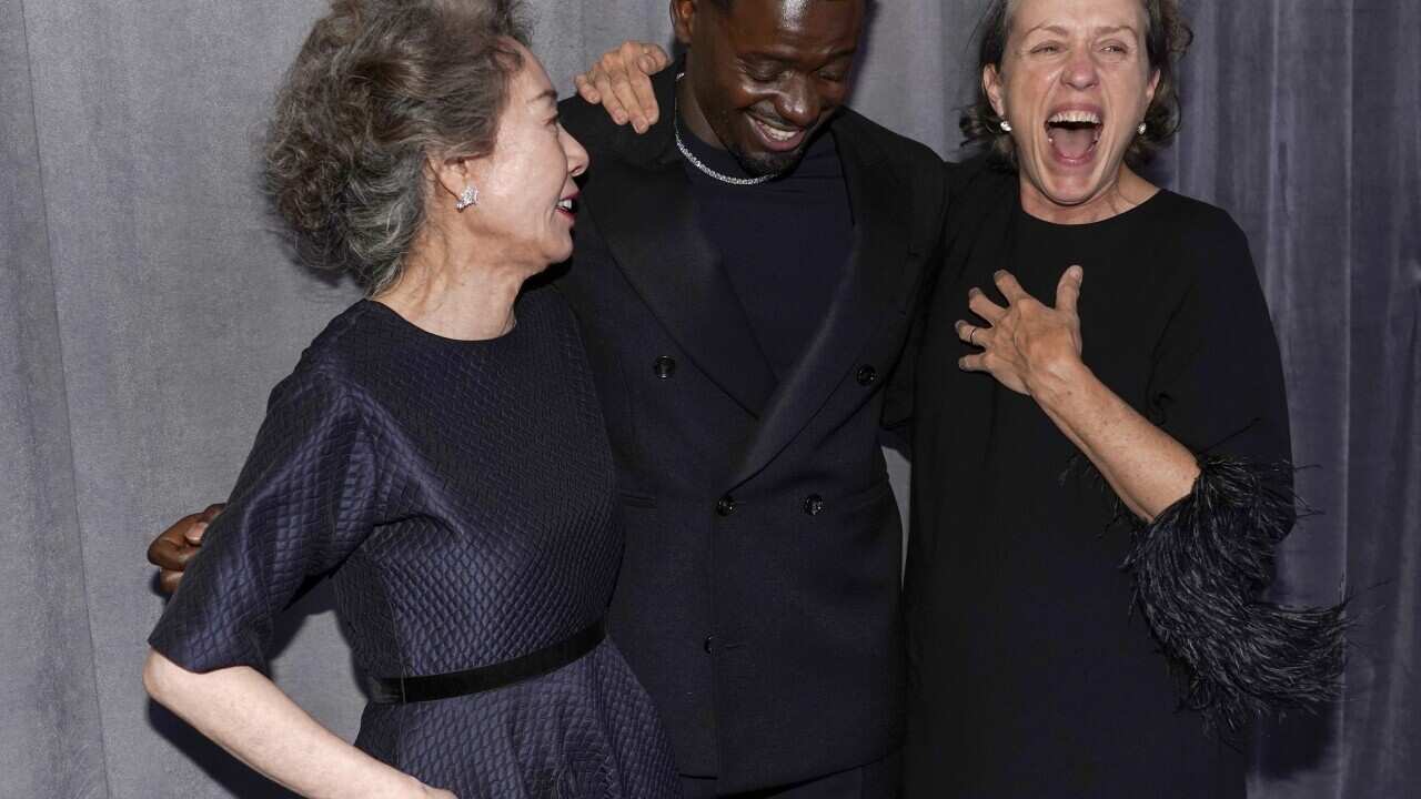 Winners Youn Yuh-jung, Daniel Kaluuyad and Frances McDormand pose outside the 93rd Annual Academy Awards press room.