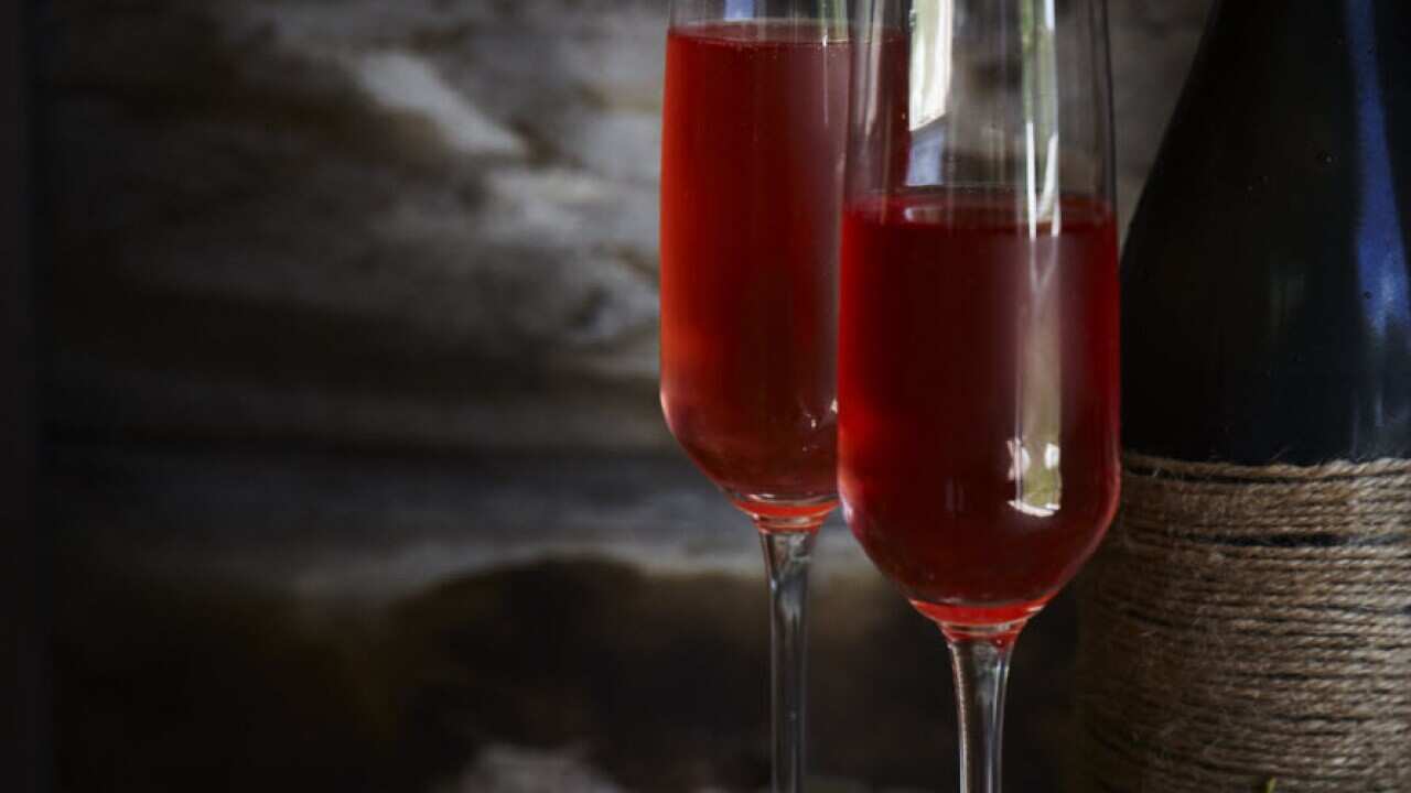 Champagne and liqueur cocktail with brioche chips