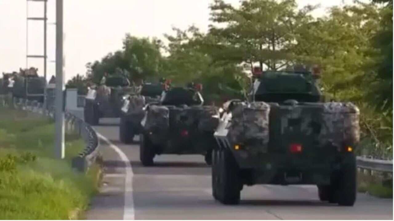 The footage shows army tankers purportedly moving towards the Hong Kong border.