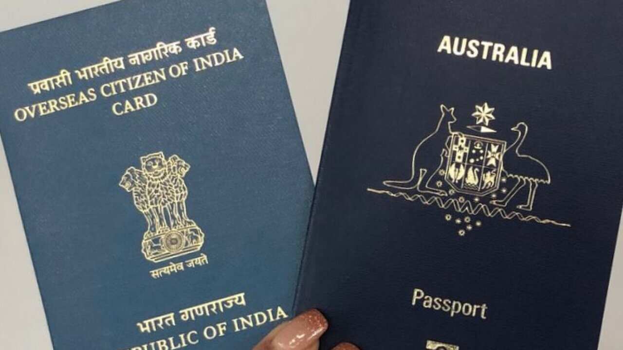 OCI card which is meant to be a lifelong visa, and an Australian passport