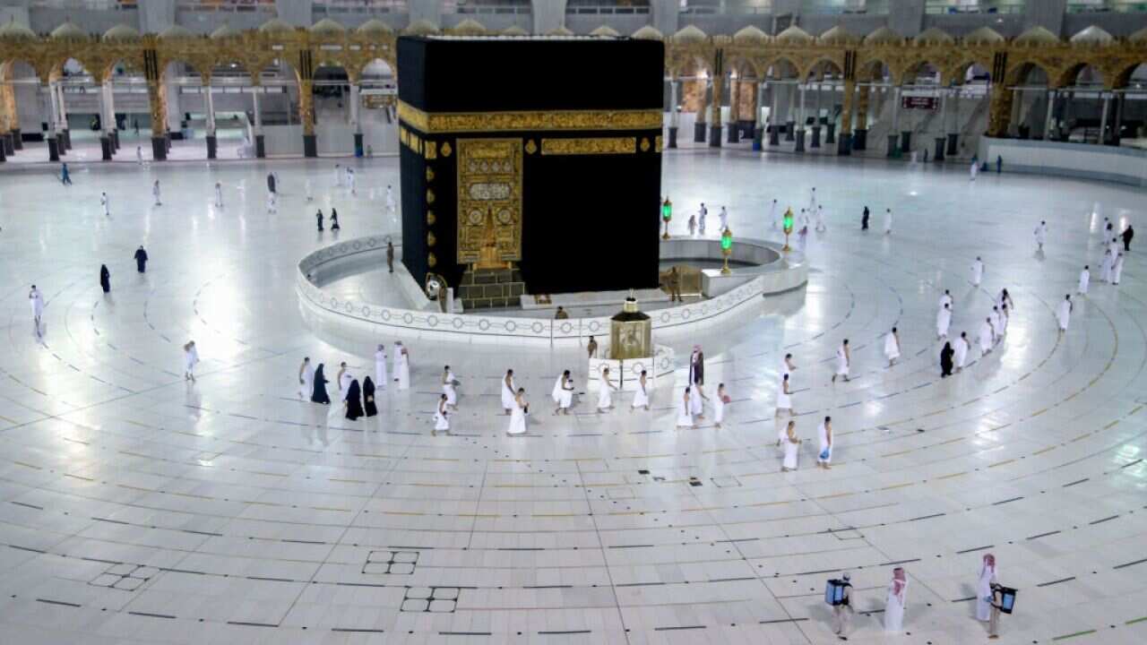 Saudis and foreign residents circumambulate the Kaaba in the Grand Mosque complex in the holy city of Mecca on 4 October. 