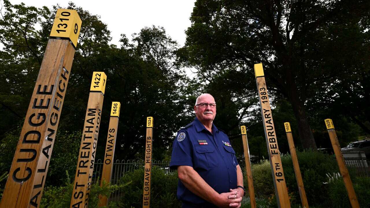 Former Cockatoo fire brigade captain stands at the Ash Wednesday memorial