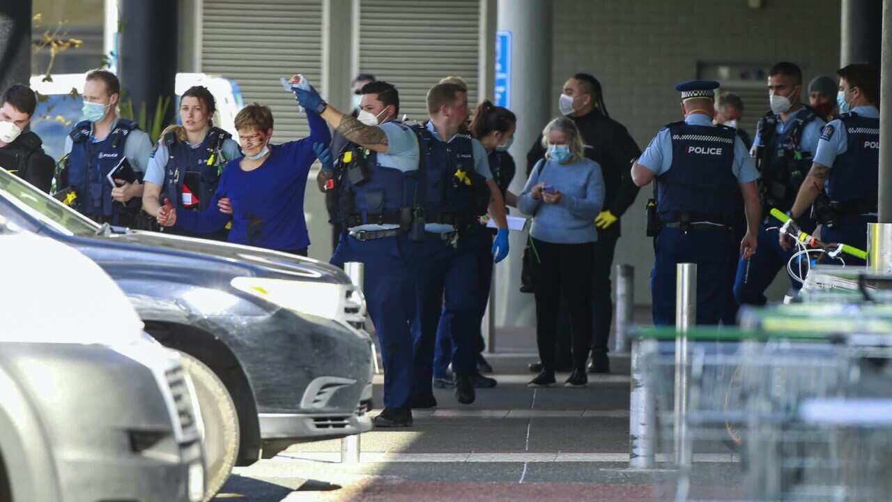 New Zealand authorities said Friday they shot and killed a violent extremist after he entered a supermarket and stabbed and injured several shoppers.