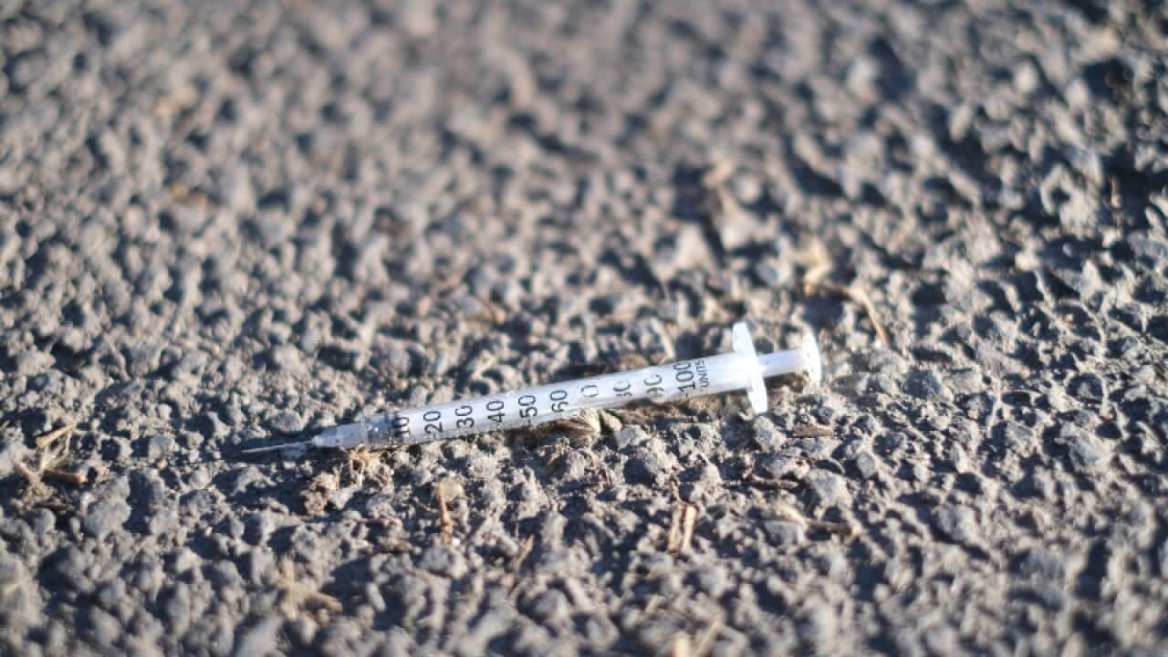 A used needle seen along the street close to Medically Supervised Injecting Room in North Richmond on 27 Jun 2019