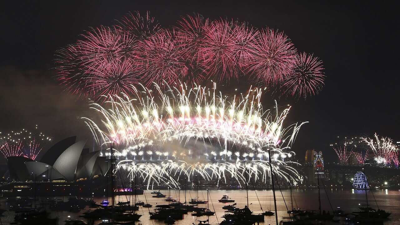 Fireworks explode over the Opera House and Harbour Bridge during New Year's Eve fireworks display  in Sydney, Australian, Friday, Jan. 1, 2016.(AP Photo/Rob Griffith)