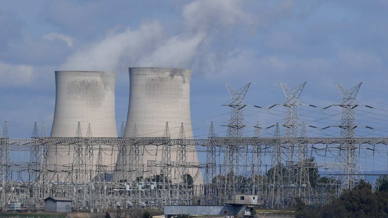 A general view of the Bayswater coal-fired power station cooling towers and electricity distribution wires in Muswellbrook, in the NSW Hunter Valley region.