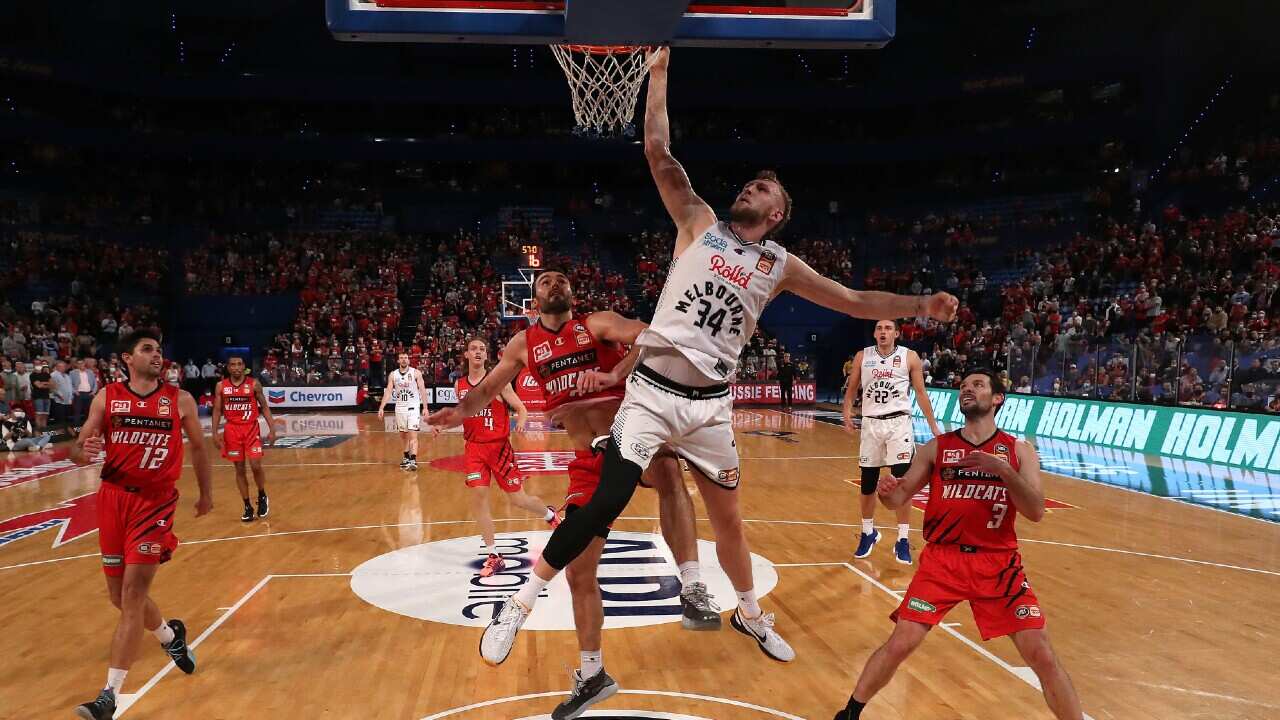 Jock Landale of Melbourne United attacks the rack against Perth Wildcats