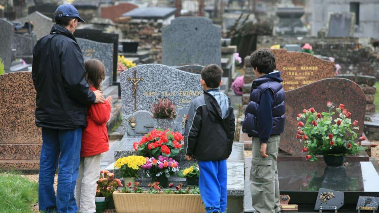 Family at grave