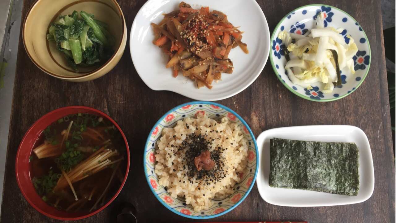 A traditional, simple, Japanese meal: ichijyu sansei (one soup and three dishes). 