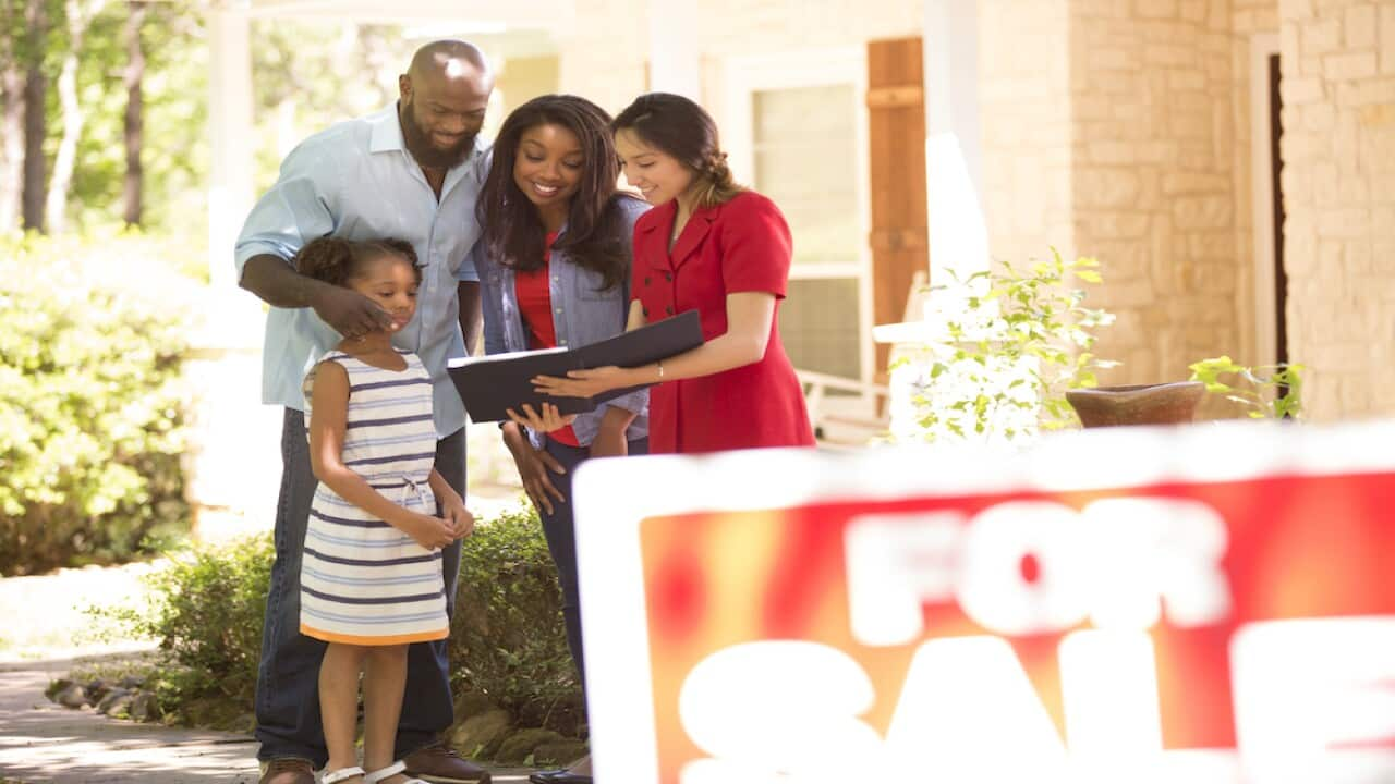 Family looking at new home to purchase.