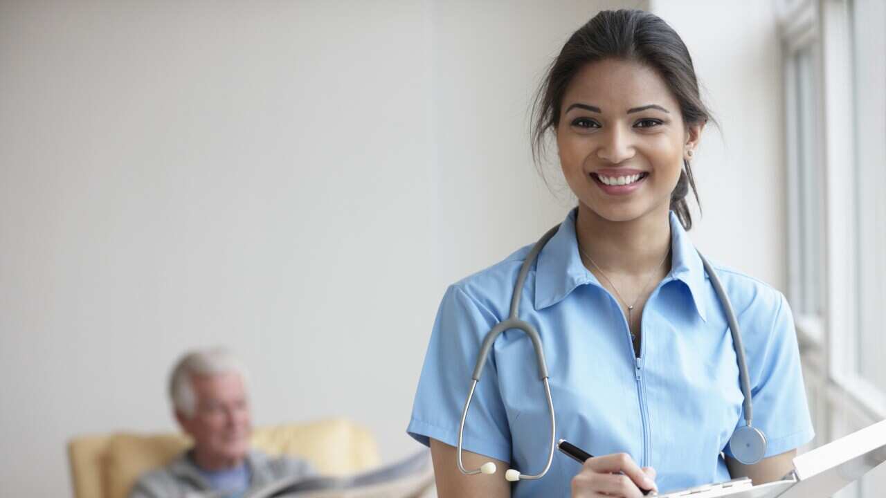 nurse caring for patient