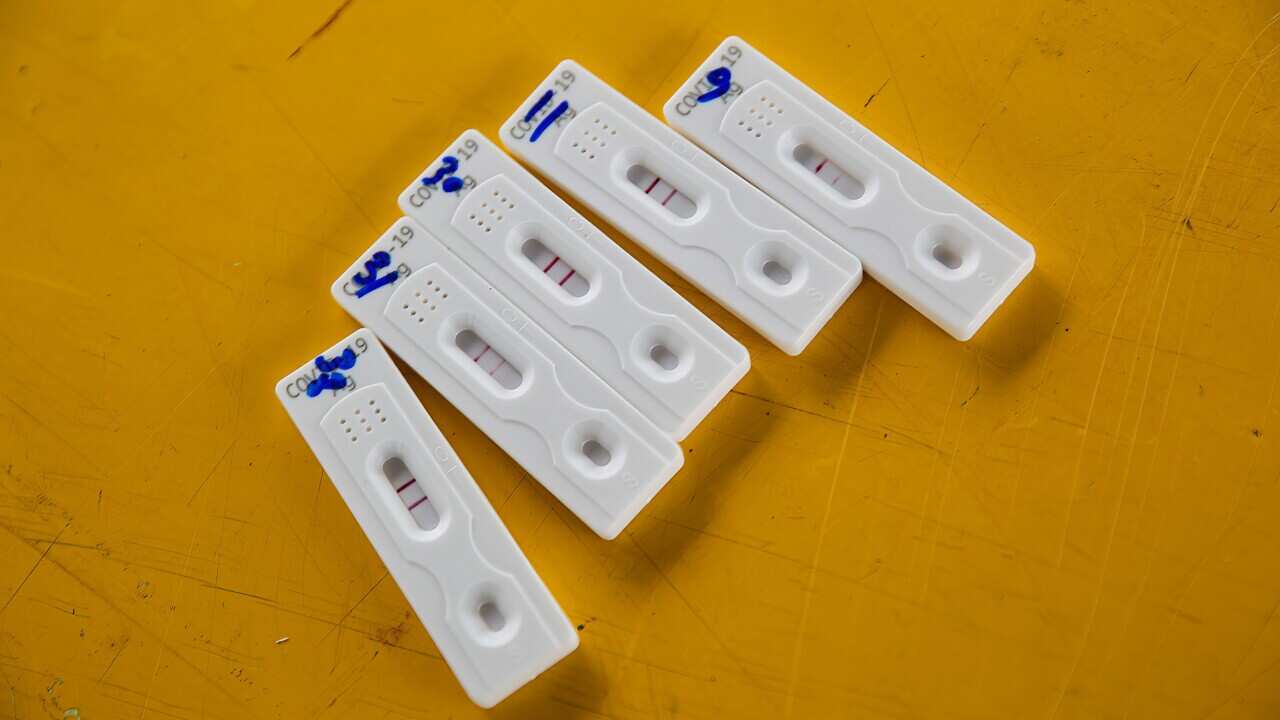 COVID-19 rapid antigen test kits seen on a table during the mobile COVID -19 testing at Chalong Krung housing community in Thailand.