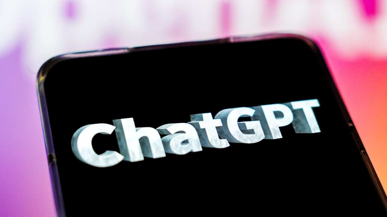 The logo of ChatGPT is displayed on a smartphone.