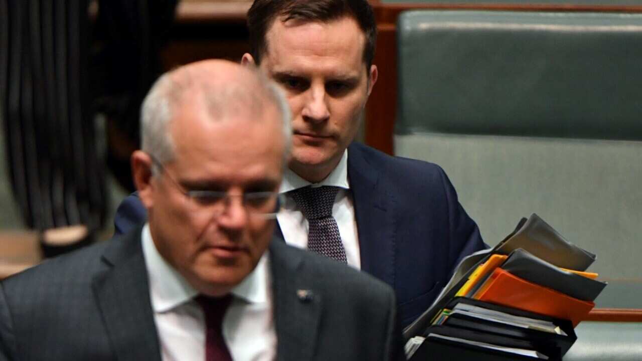 Prime Minister Scott Morrison and Minister for Immigration Alex Hawke at Parliament House in Canberra. (file)