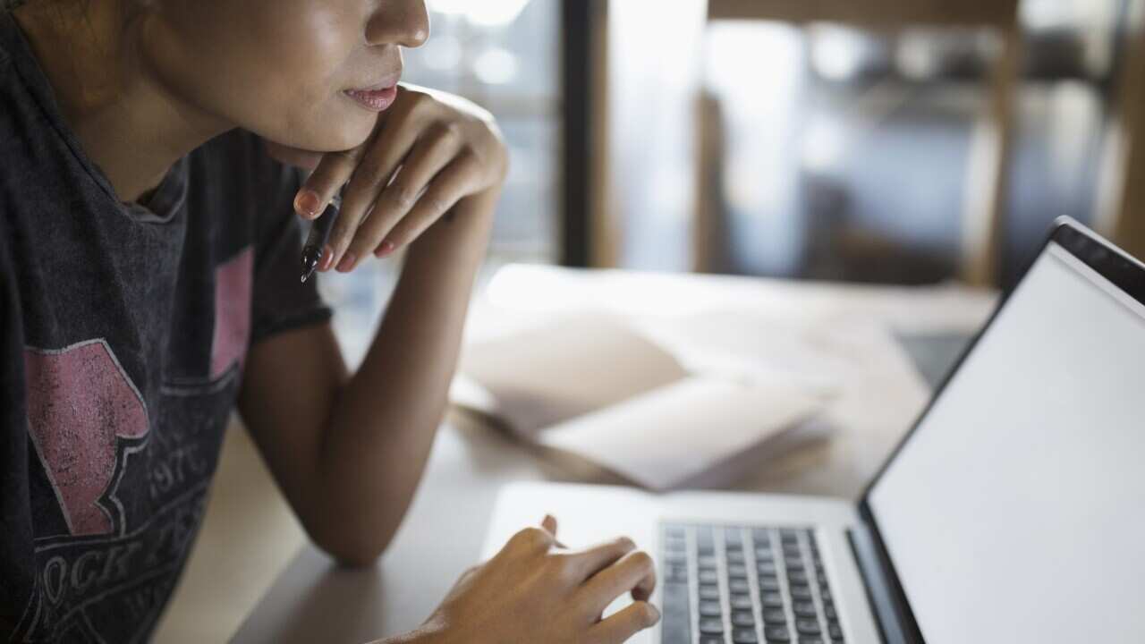 young woman at computer