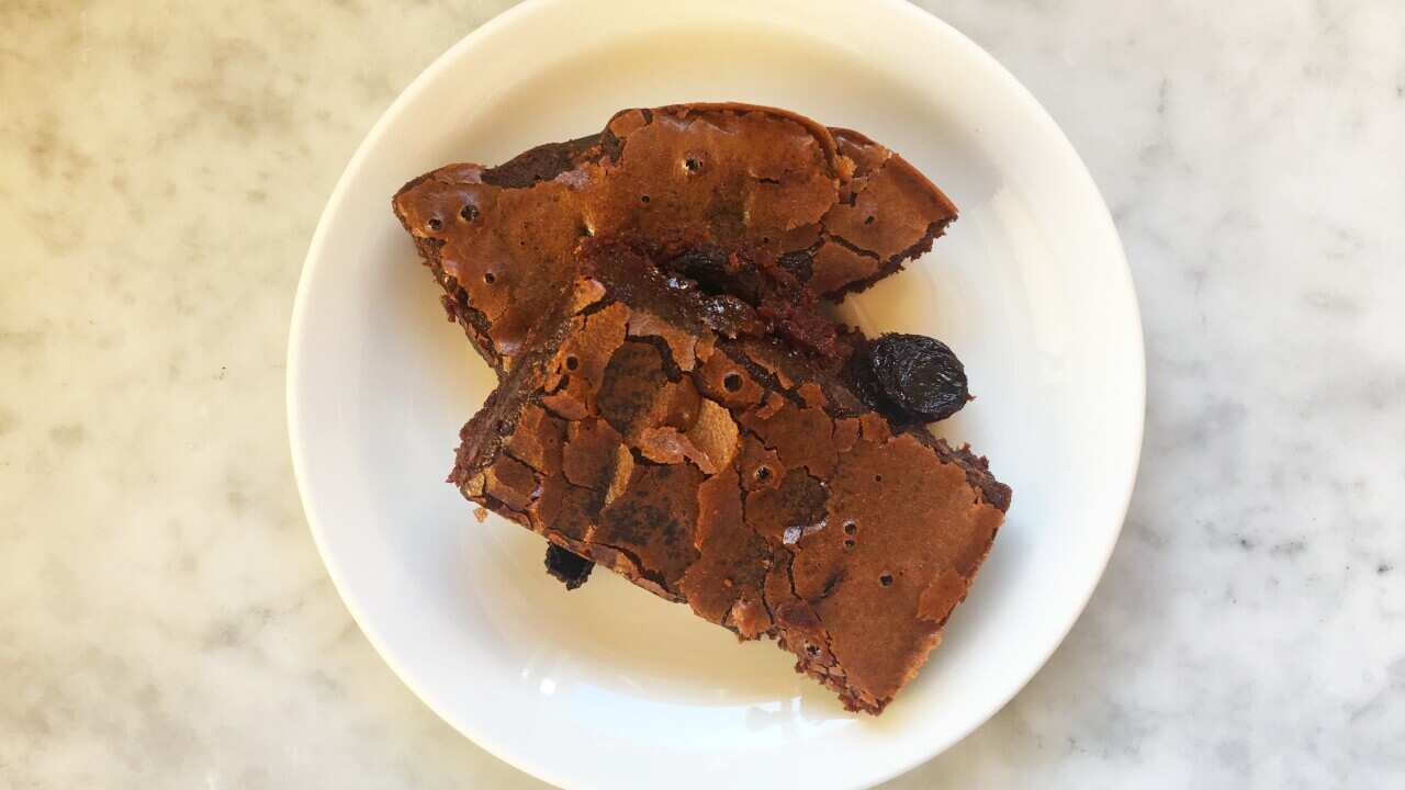 A plate of brownies in morning light.