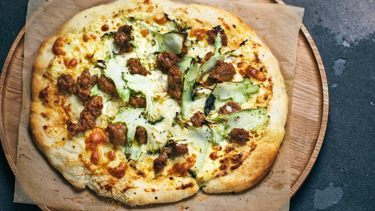 Broccoli and sausage pizza