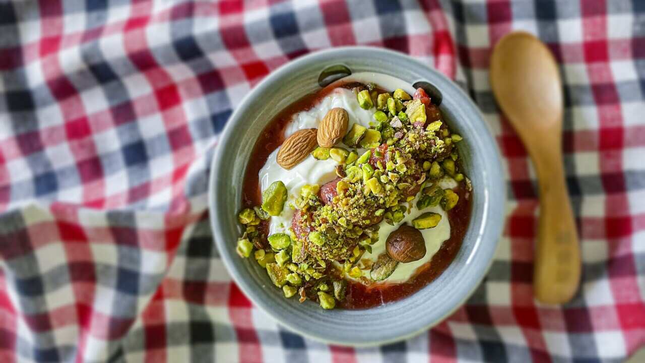 Assorted Nuts with Plain Yoghurt and Strawberry Syrup