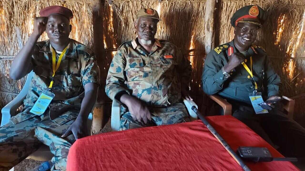 Gen Simon Gatwech Dual, William Gatjiath Deng and Unidentified soldier 