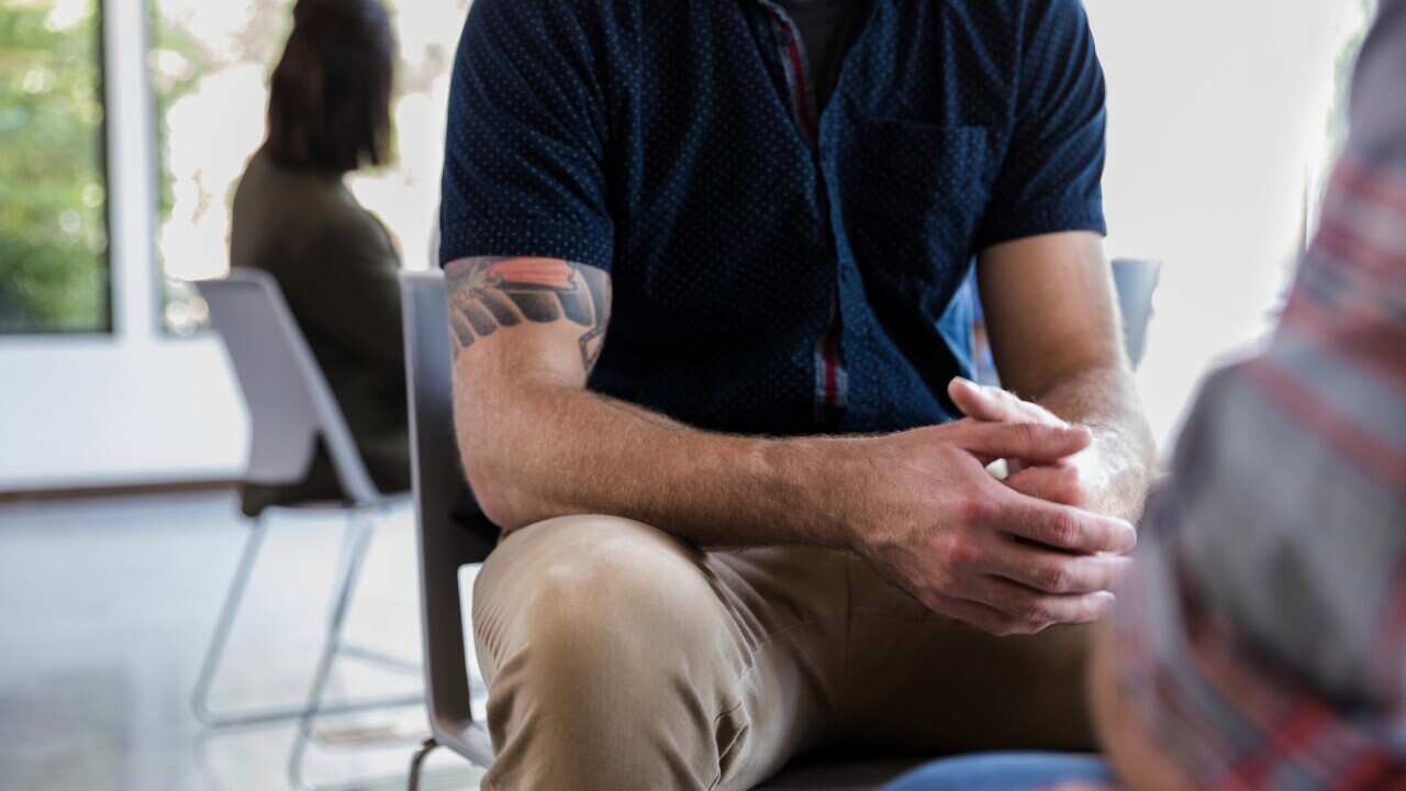 Unrecognizable man during counseling session