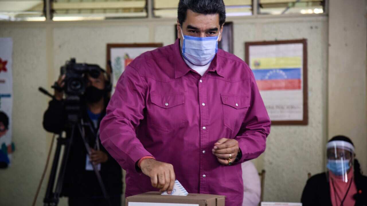 Venezuelan President Nicolas Maduro votes in the parliamentary election. 