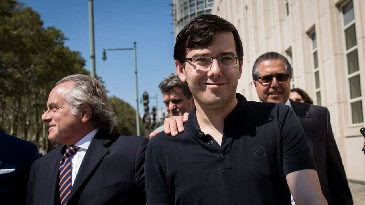 Former pharmaceutical executive Martin Shkreli (centre) with his lawyer, Benjamin Brafman, outside the US District Court for the Eastern District of New York.