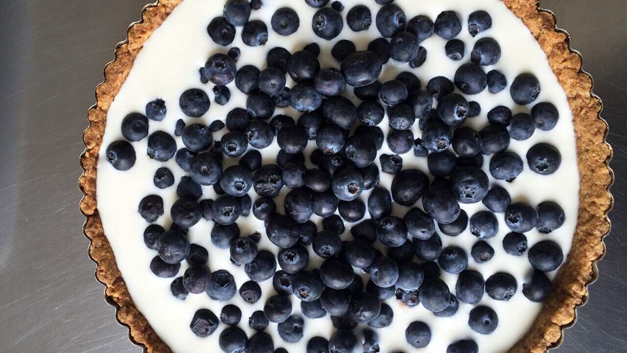 Buttermilk-blueberry tart with walnut crust