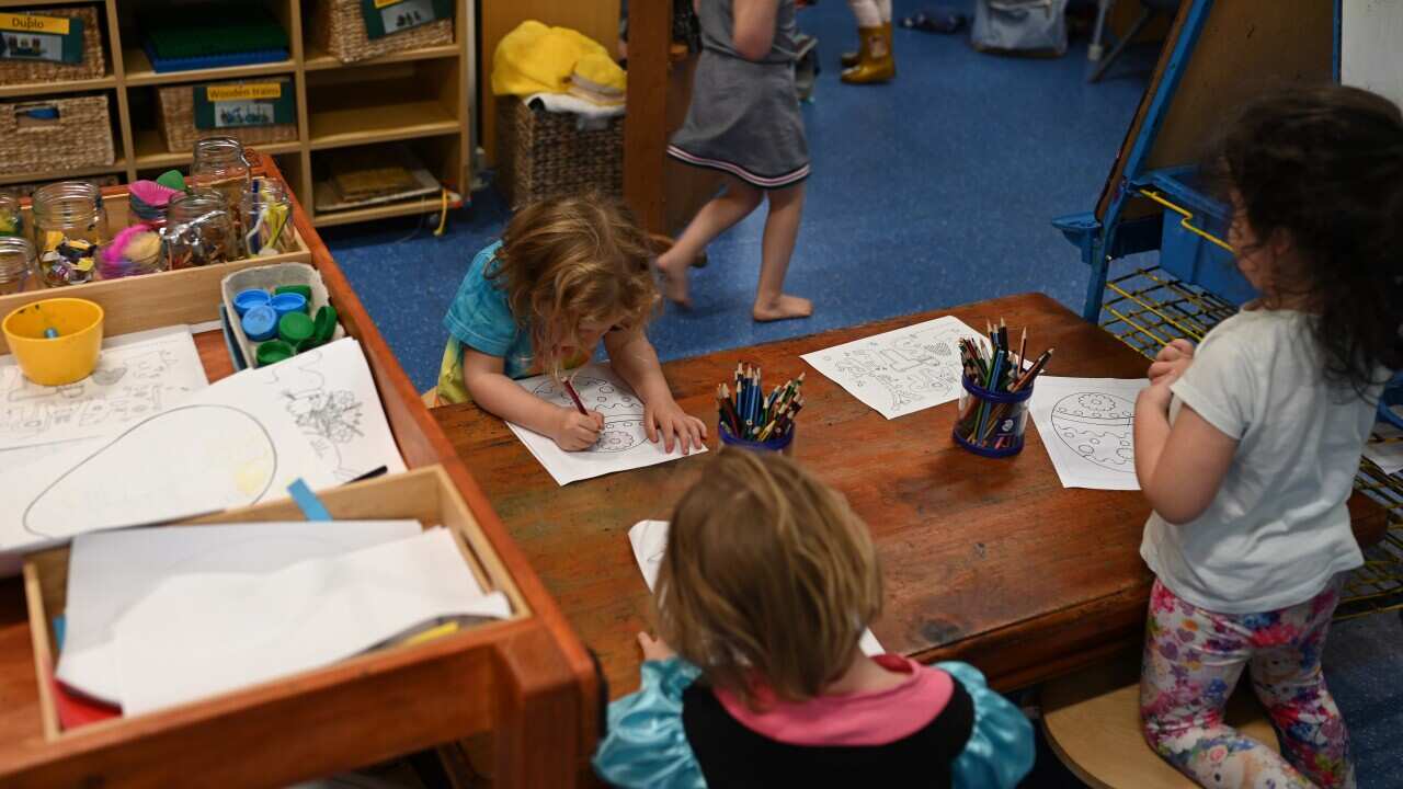 A small group of children play at the Robertson Street Kindy Childcare Centre in Helensburgh south of Sydney.