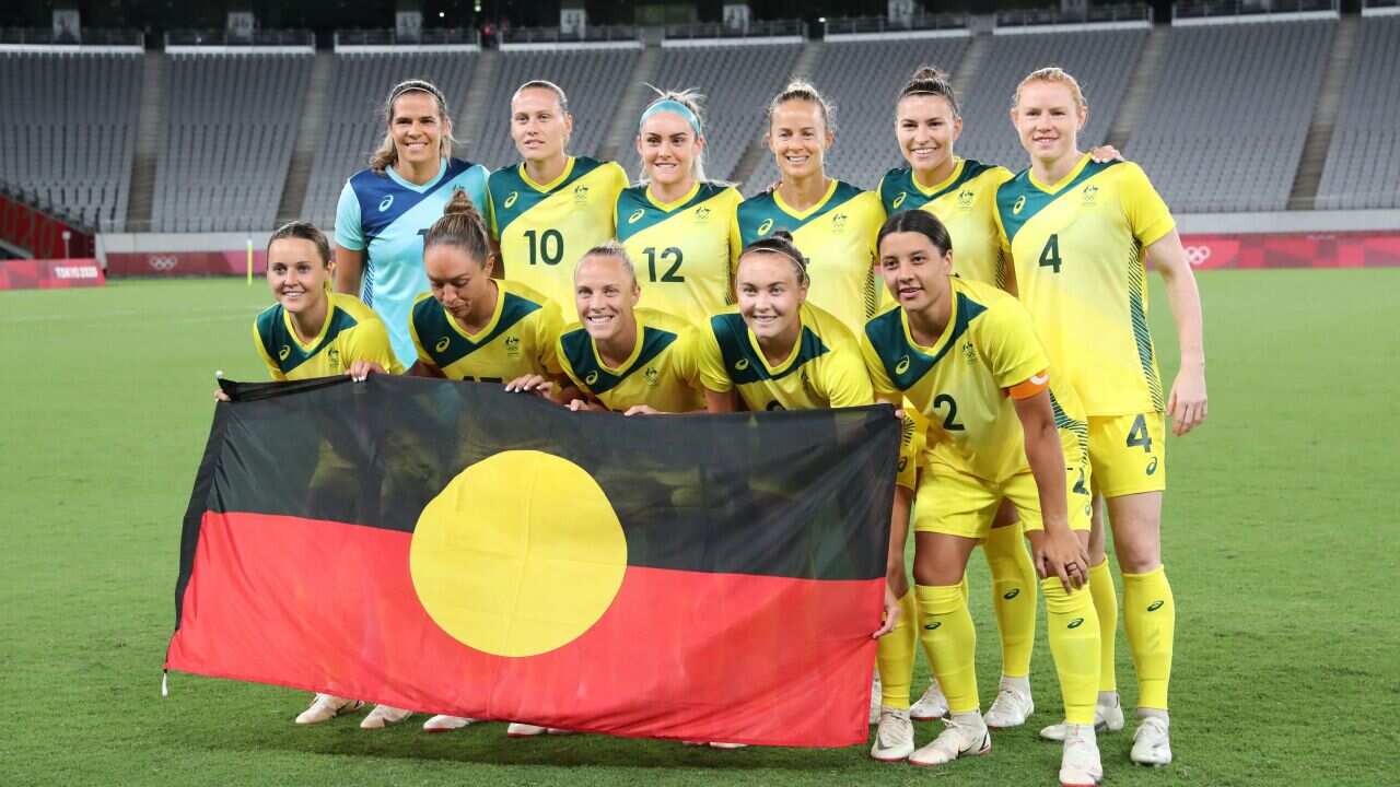 Matildas with Aboriginal Flag at Olympics