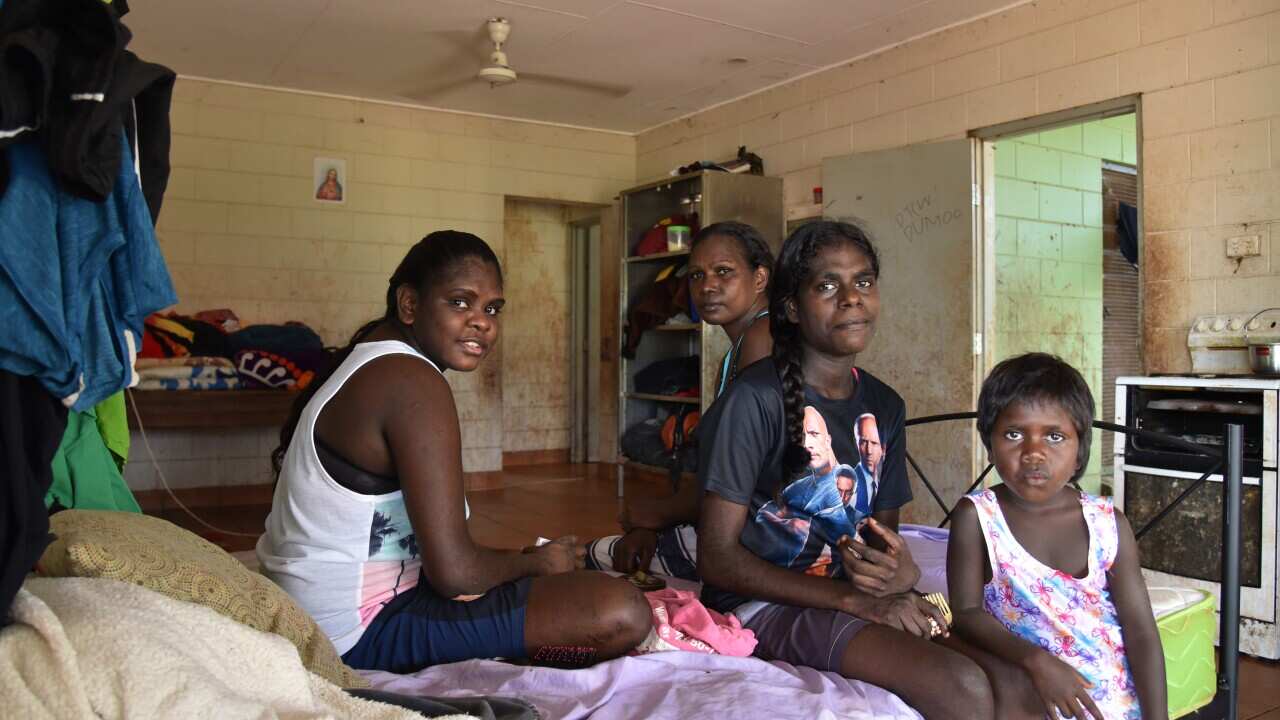 (L-R) Cassandra Chula, Gloria Chula, Heather Tcherna and Majella Tipiloura in their home where 16 people live in Wadeye, Northern Territory, Friday, February 14, 2020. (AAP Image/Gregory Roberts) NO ARCHIVING