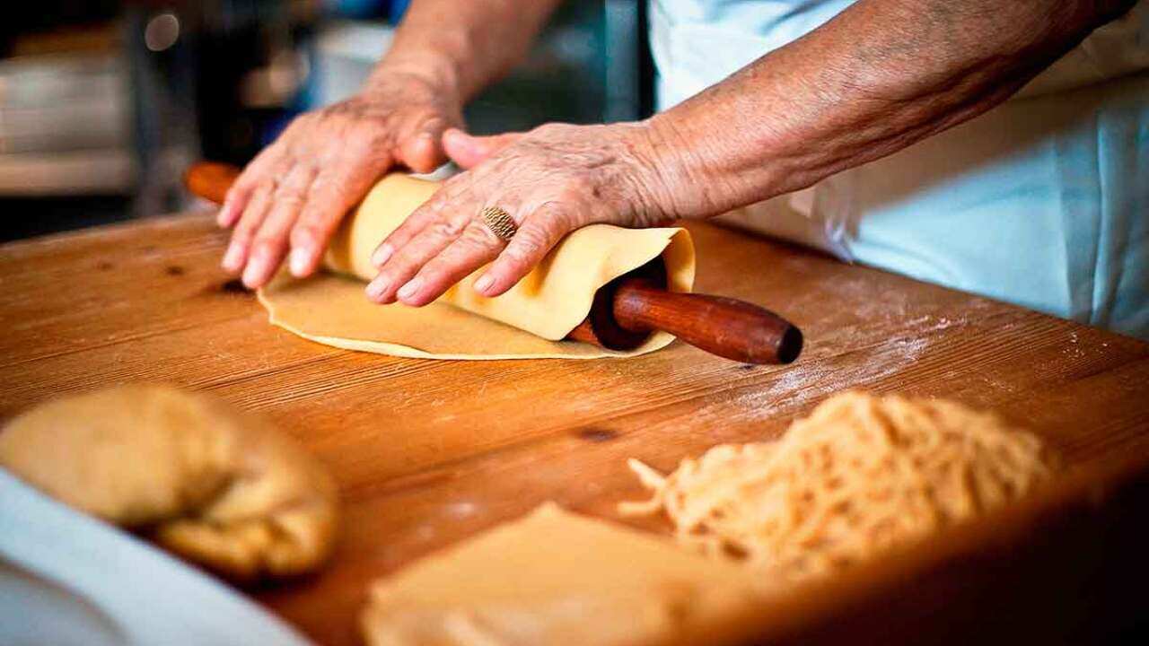 Italian woman making pasta