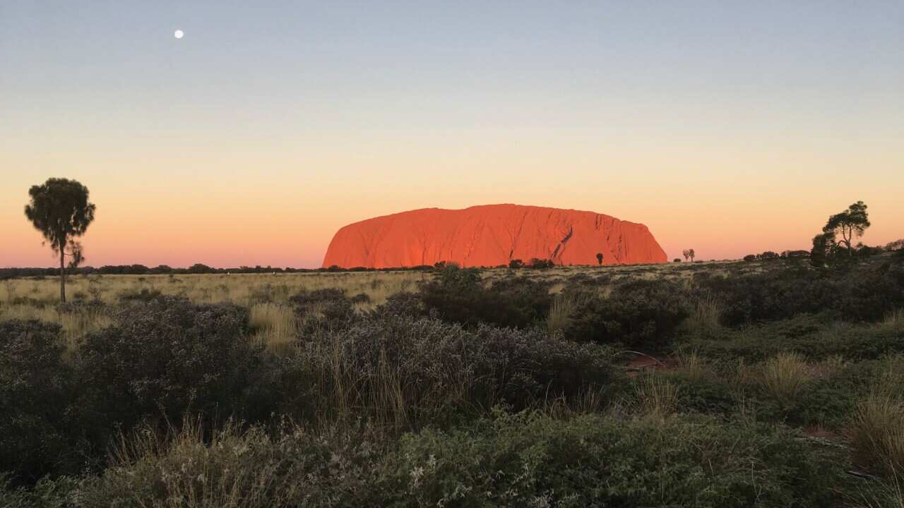 Uluru at sunset at the Uluru-Kata Tjuta National Park in the Northern Territory on Wednesday, June 7, 2017. Thirty to 40 per cent of Uluru is made up of sacred sites for Indigenous Australians. (AAP Image/ Michael Wayne) NO ARCHIVING, EDITORIAL USE ONLY