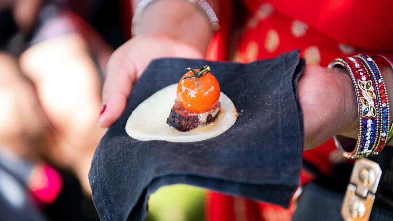 Cassava taco with seared wallaby, smoked cherry tomato, macadamia & wattle seed butter, green salsa