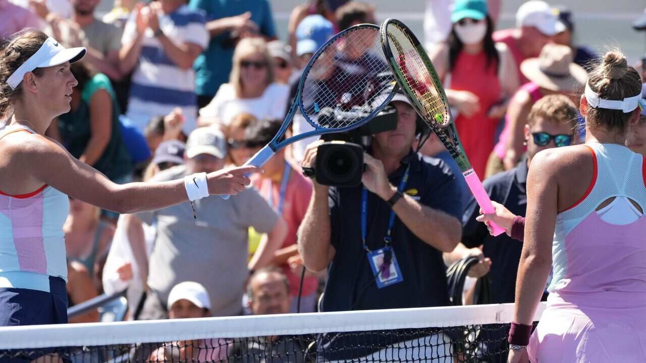 Ukrainian Marta Kostyuk and Belarusian Victoria Azarenka exchanged a quick tap of the racket on Court 17.