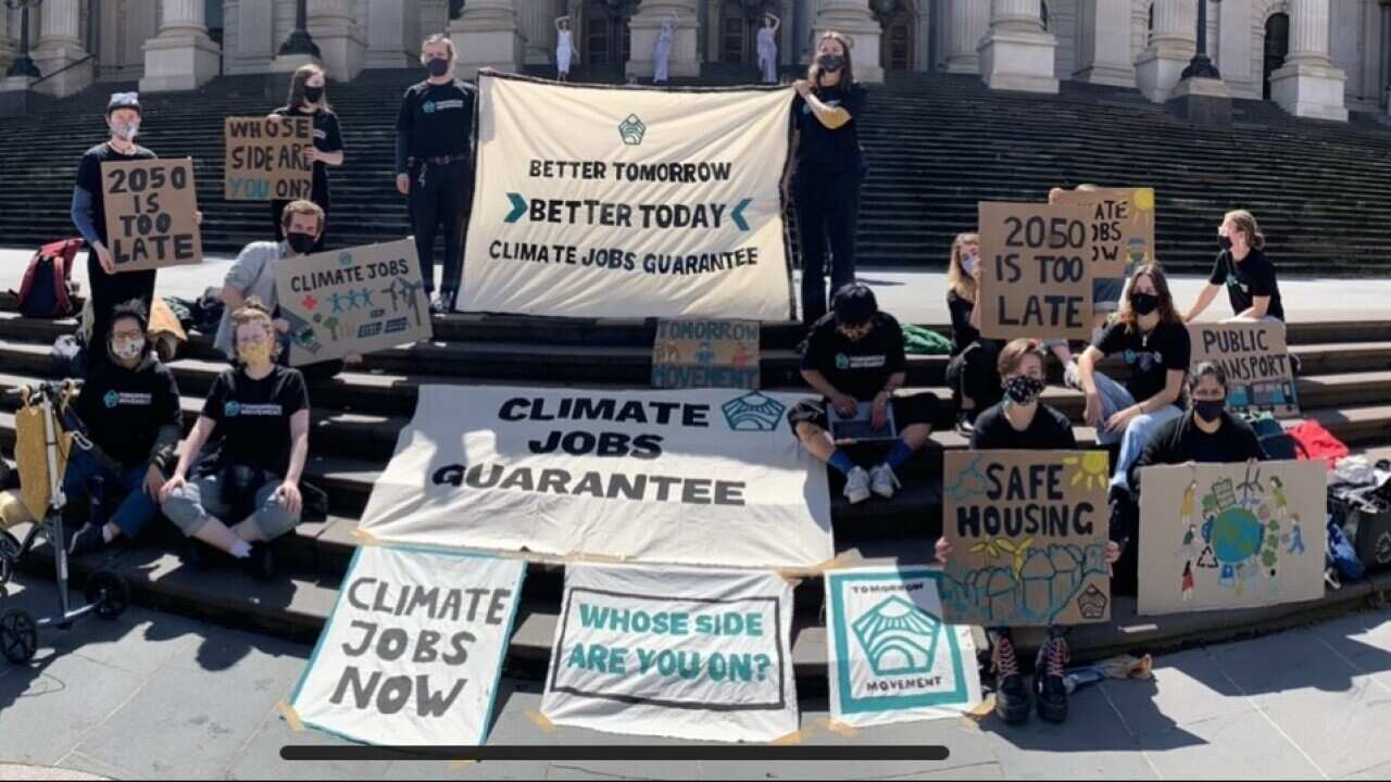 University students participate in a protest outside the Parliament of Victoria on 25 October, 2021. 