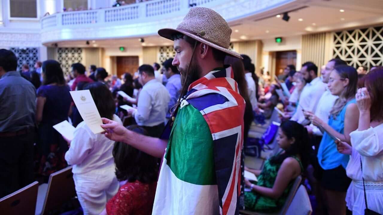 Australian citizenship recipients and their guests attend a citizenship ceremony on Australia Day in Brisbane.