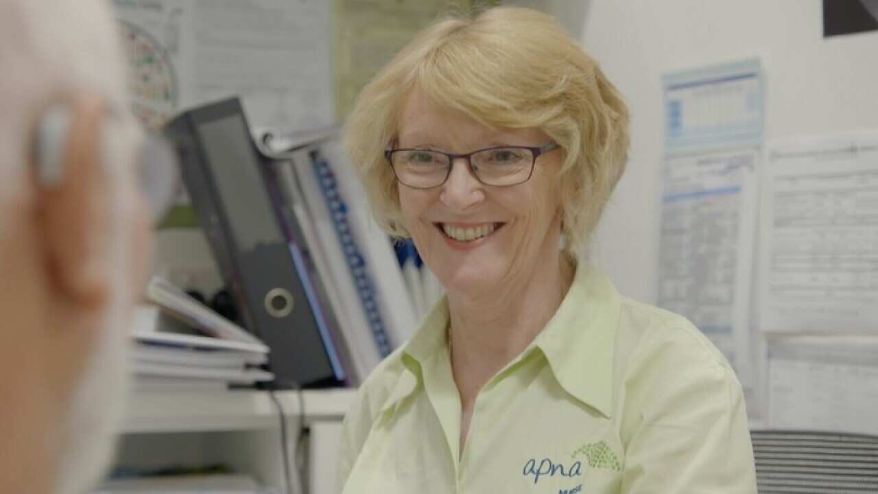 Karen Booth with patient
