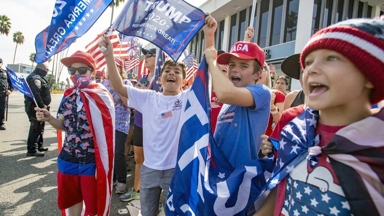 Young people greeting Donald Trump on the campaign trail in Los Angeles
