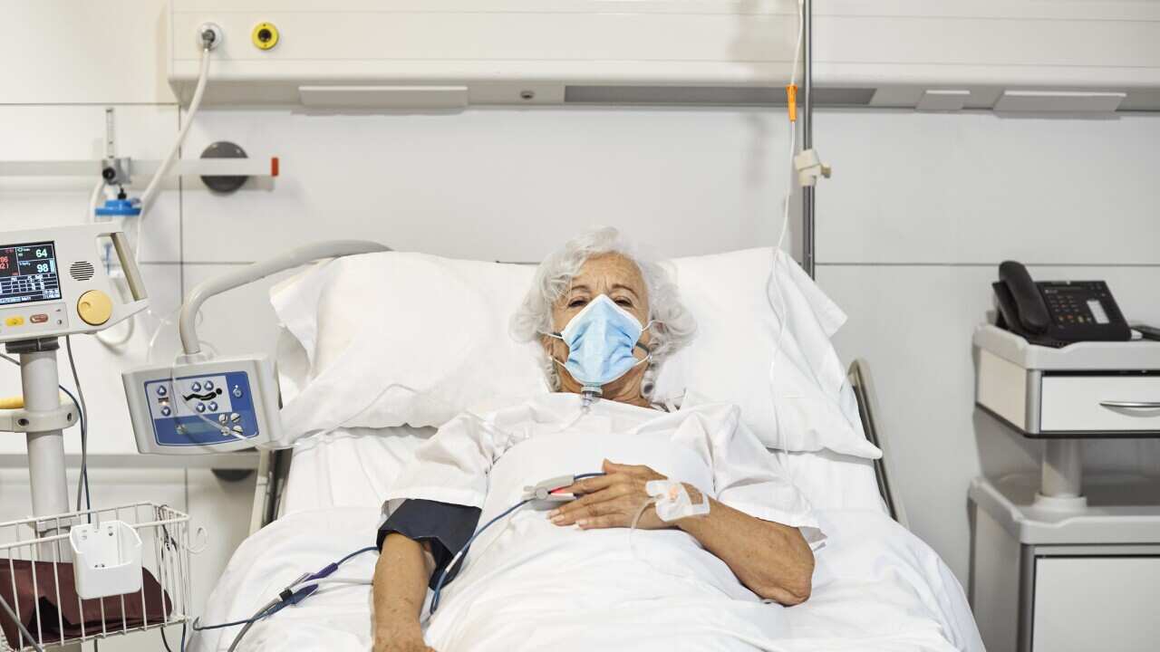 A woman on a ventilator in hospital during the COVID-19 pandemic.