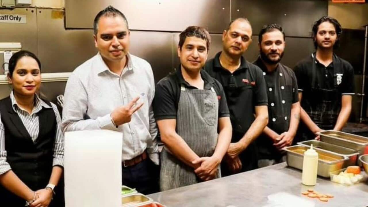 7 out of the 14 workers employed at Raj Singh’s Punjabi Curry Cafe are international students.