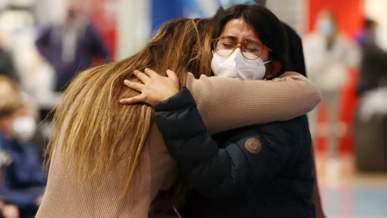 Emotional reunions took place at Auckland International Airport on 13 April, 2022 after New Zealand borders reopened to Australian tourists. 