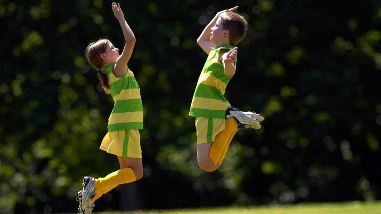 Australian kids jumping in the air