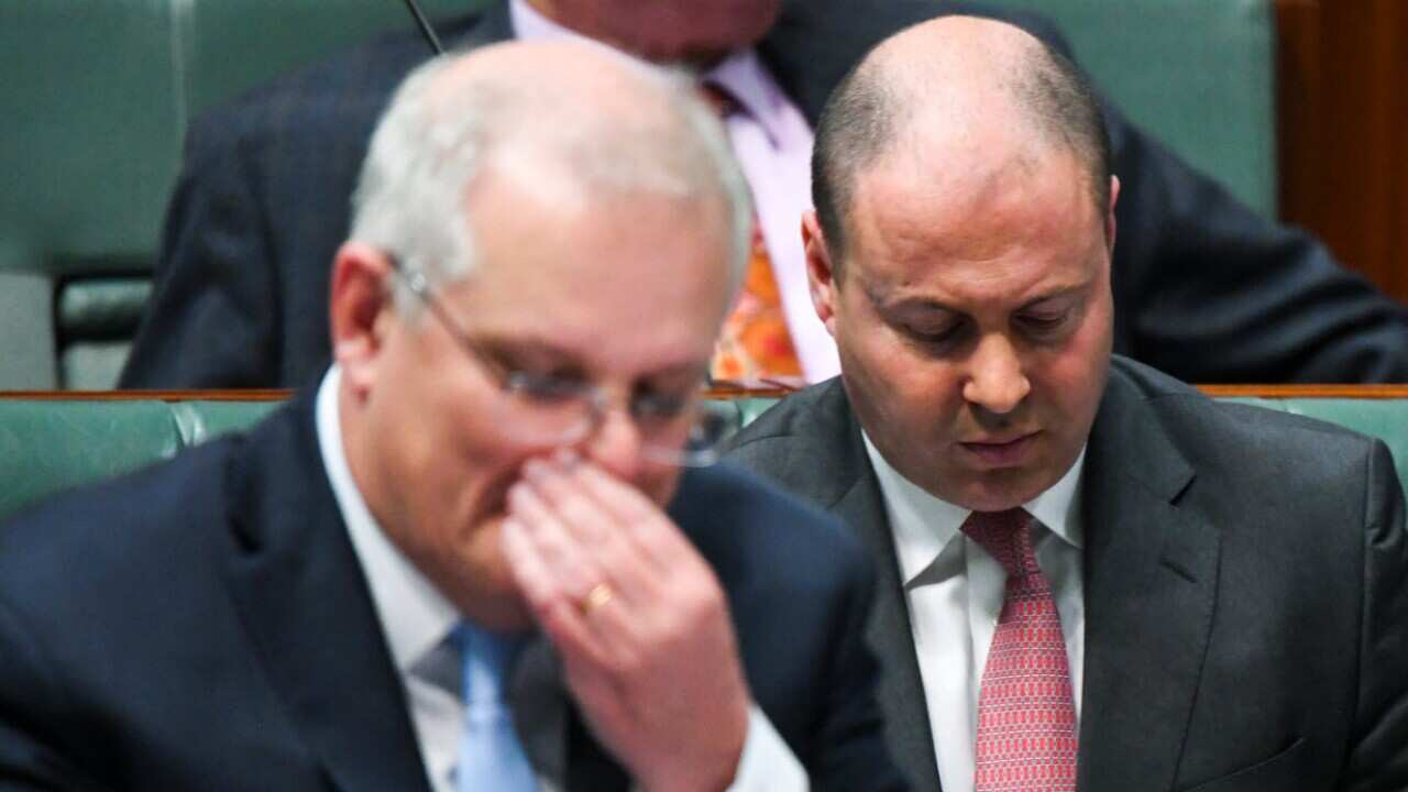 Prime Minister Scott Morrison and Treasurer Josh Frydenberg during Question Time at Parliament House in Canberra.