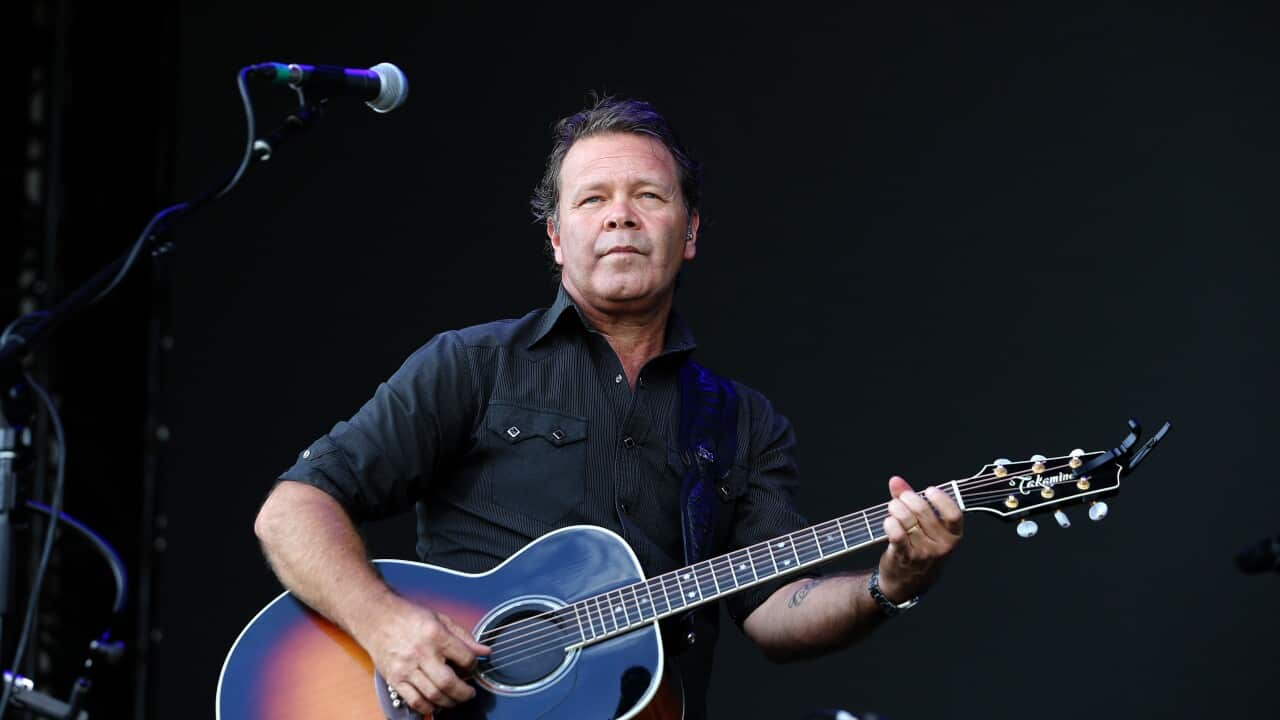 Troy Cassar Daley performs during Cold Chisel's The Blood Moon Tour 2020 at the Tamworth Country Music Festival, Sunday, 19 January 2020. (AAP Image/Peter Lorimer) NO ARCHIVING