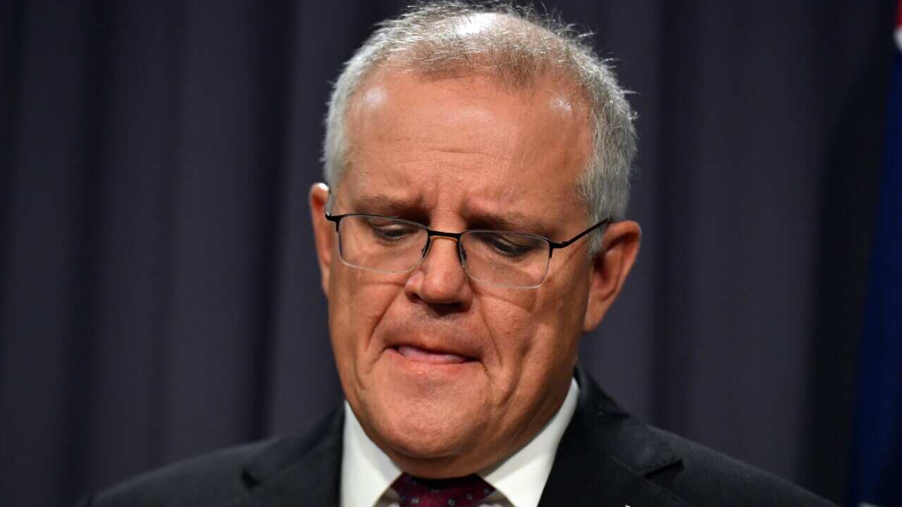 An emotional Scott Morrison during a press conference at Parliament