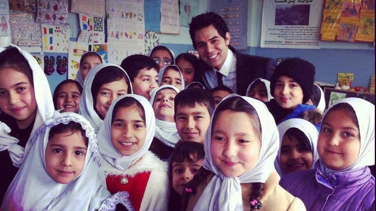 Omid Nezami with Afghan school children before the ban on girls attending high school