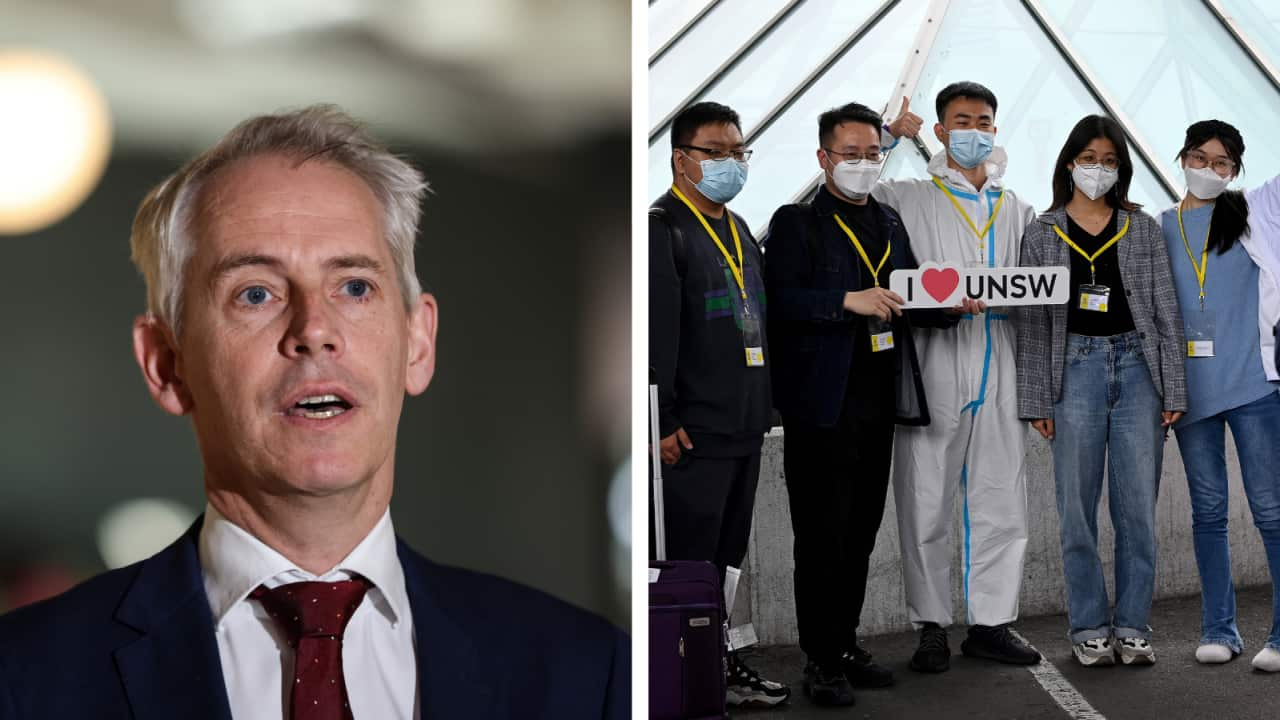 A composite image of a man in a navy suit, red tie and white shirt and five students wearing face masks holding a sign that reads "I heart UNSW"