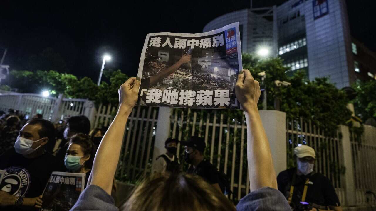 Three former Apple Daily editors have been arrested under Hong Kong's national security law.