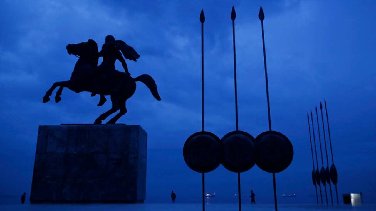 A bronze statue of Alexander the Great and copies of round shields and the Macedonian infantry's Sarissa pikes, in Thessaloniki, Greece